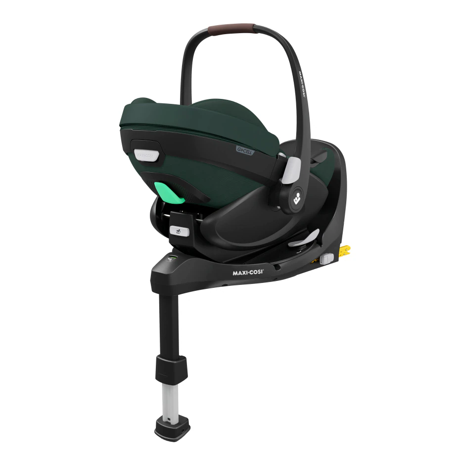 dunkelgrüne babyschale auf base